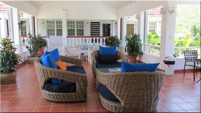 Our breezy sitting area overlooking the pool
